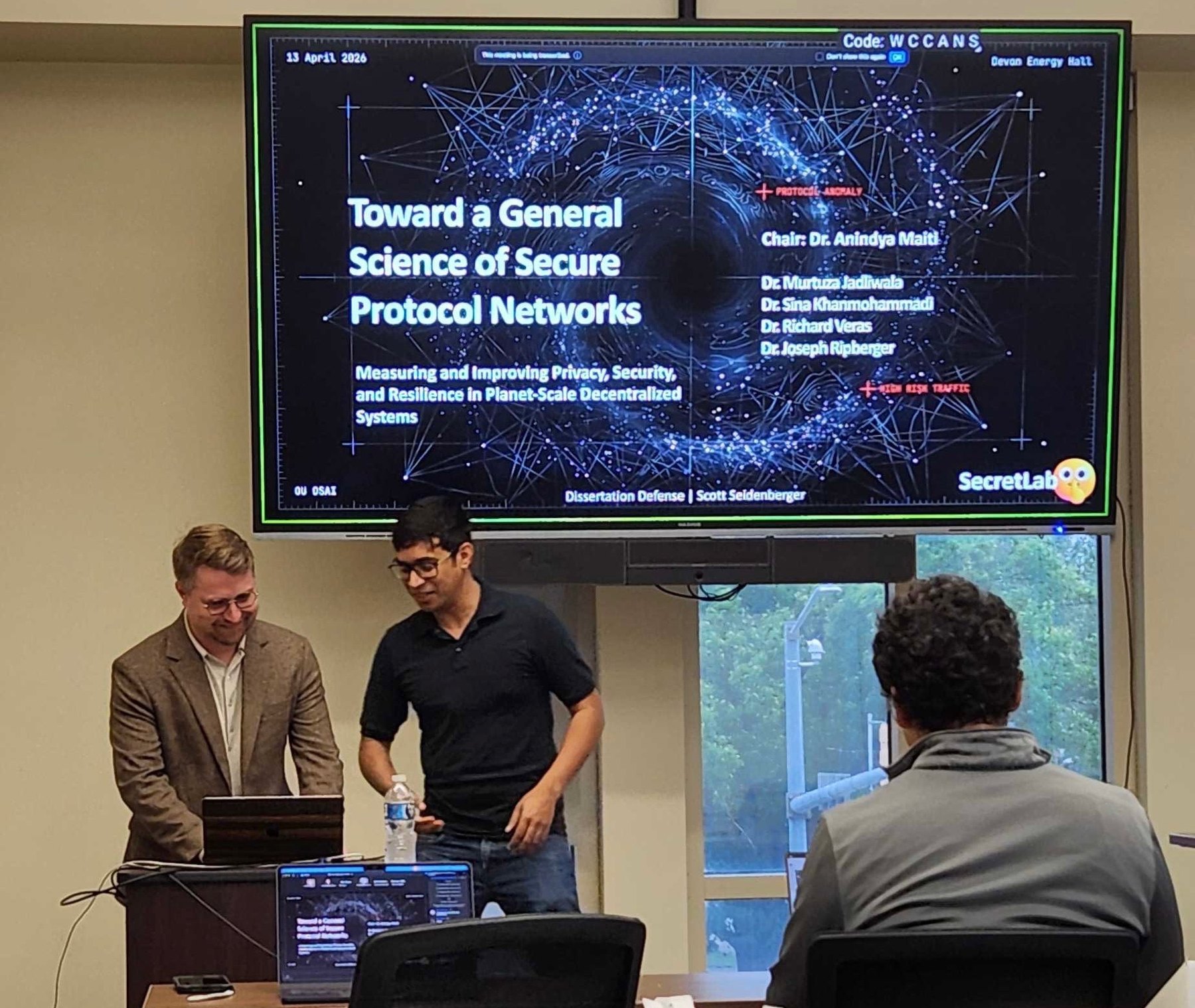 Scott Seidenberger presenting his dissertation defense at the University of Oklahoma.